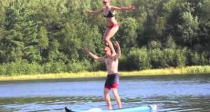 Acrobatic-juggling-act-while-on-a-stand-up-paddle-board-Rumble