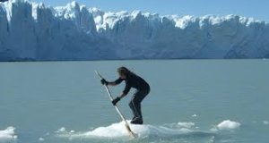 Person-on-an-ICEBERG-as-a-Stand-Up-Paddle-Board-People-Having-Fun-on-Icebergs-and-Glaciers