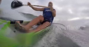 Stand-up-paddle-boarder-runs-kayaker-over-canoeist