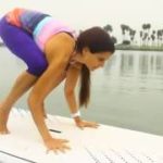 How-To-Do-Crow-Pose-on-a-Paddleboard-by-San-Diego-Paddle-Yoga
