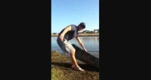 Man-falls-out-of-canoe