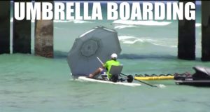 Umbrella-boarding-on-Saturn-SUP-paddle-board