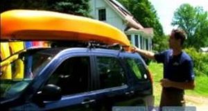 White-Water-Canoeing-Gear-Using-a-Car-Rack-to-Carry-a-Canoe